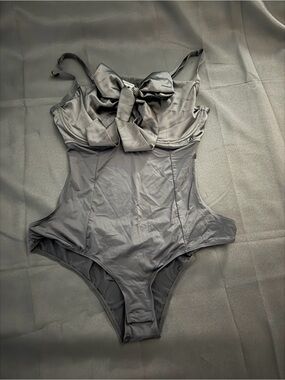 NWT Torrid Black One-Piece Bodysuit with Front Bow Size 1